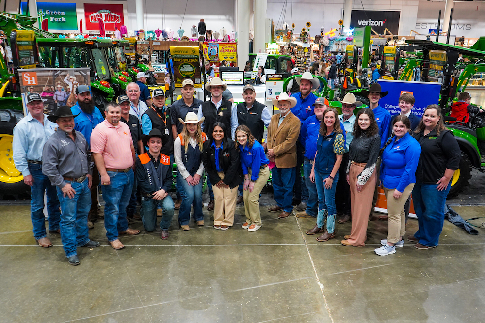 Shoppa's leadership and alumni, SHSU Ag leadership and current SHSU students pose for a photo at the Houston Livestock Show and Rodeo.